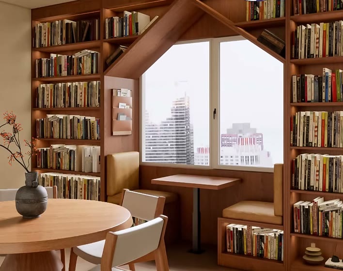 書櫃式臥榻參考：書櫃包窗＋小屋尖頂造型框＋窗下臥榻與中間桌